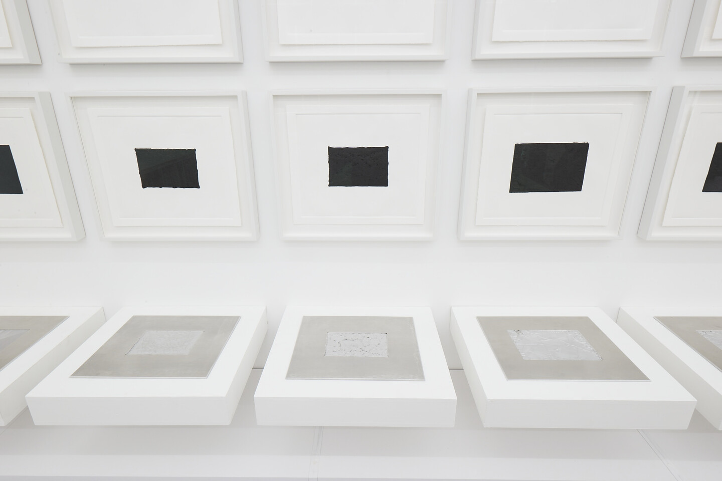 Akram Zaatari, Against Photography, 2017, 12 routed aluminum plates, 24 x 28 cm each, 4 sets of intaglio and chine-collé prints, 27 x 31 cm each