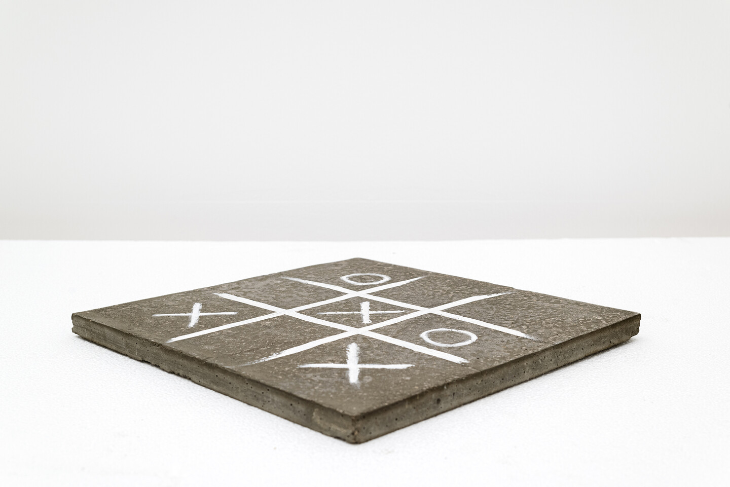 XO, 2024, Oil pastel on grout, 36 × 36 × 2 cm