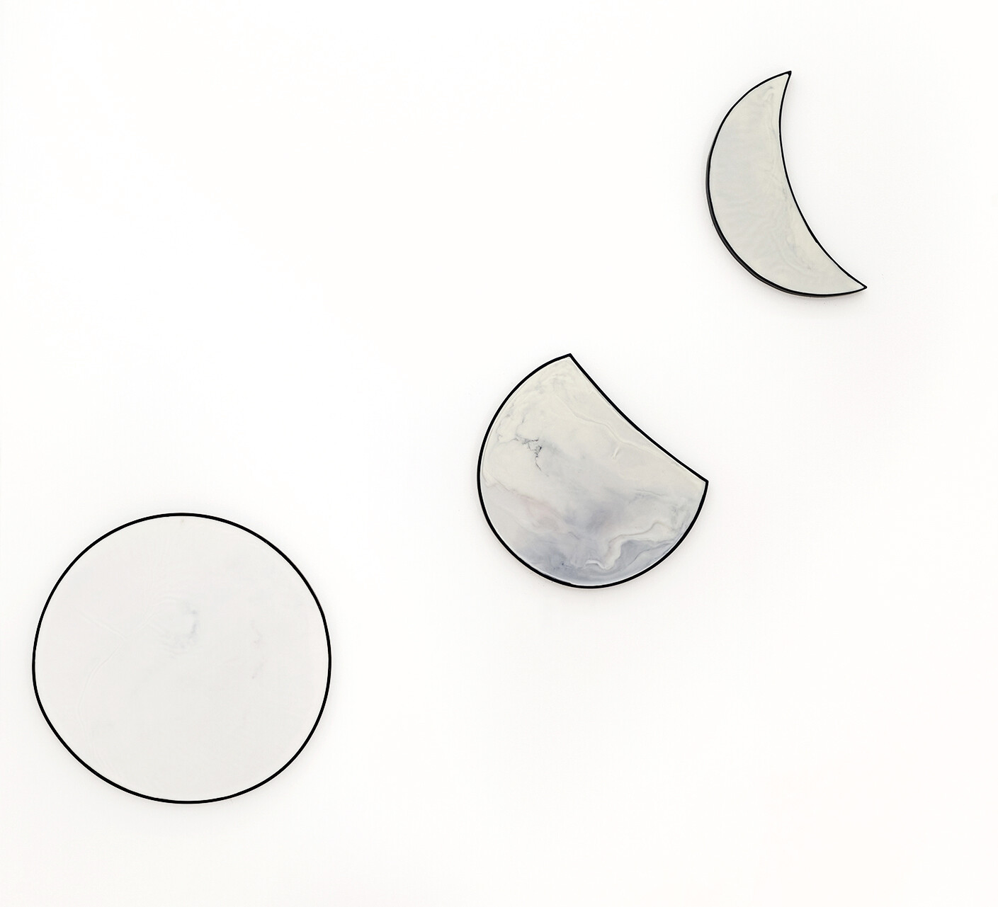 Moon(s), 2024, Beeswax, oil paint on iron and wood, ⌀  60 cm (full moon), 45 x 40 cm (waxing gibbous), 46 x 33 cm (waning crescent)