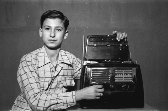 Hashem El Madani: Studio Practices, posing with radio, Rawas, now a sheikh, 1948-53, silver prints, 19 x 29 cm